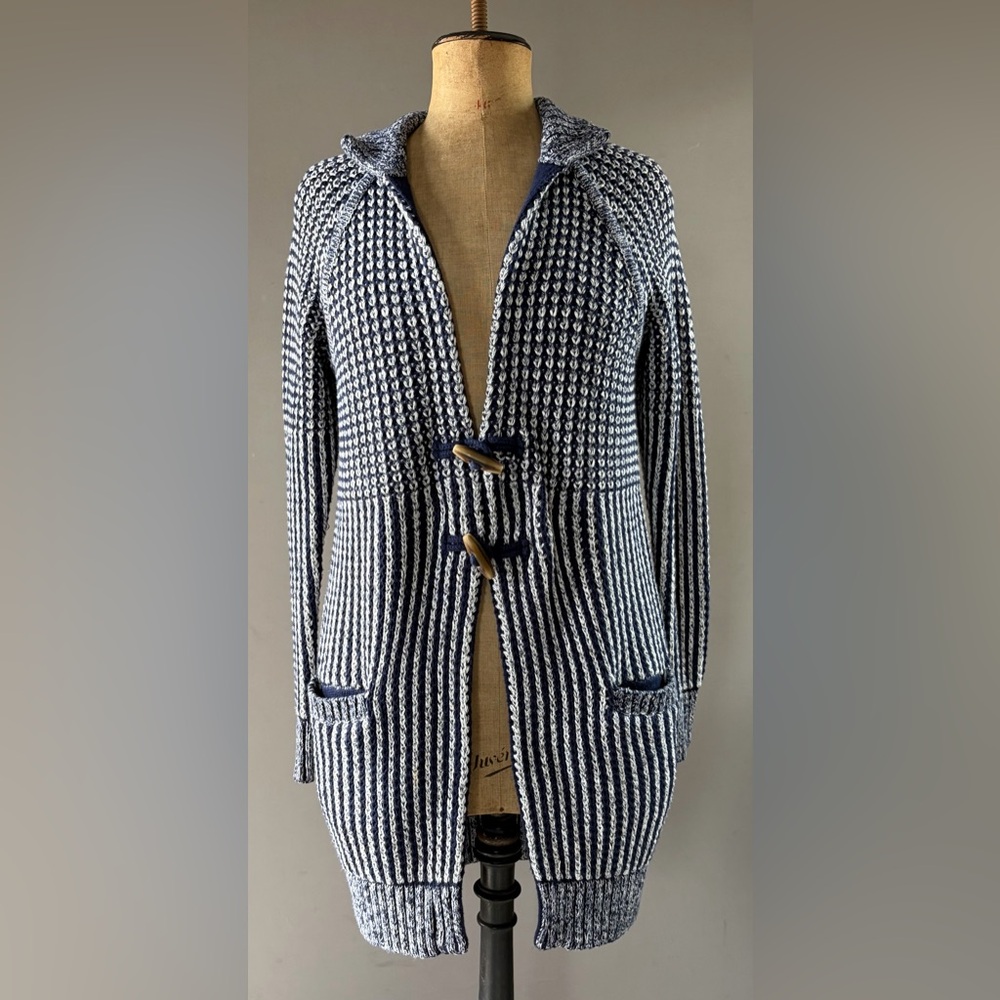Gap cable knit fisherman long cardigan with toggle closure.